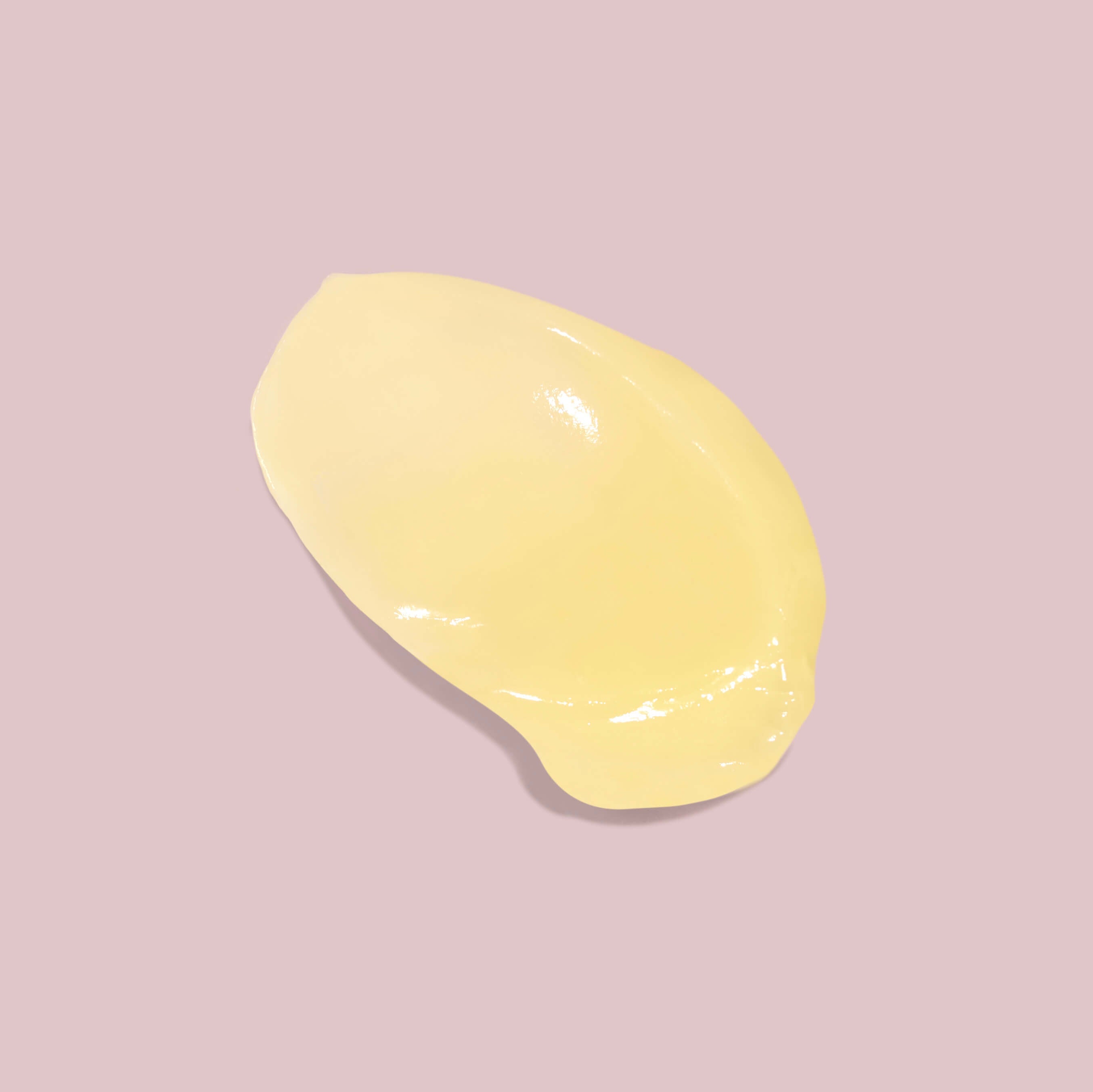 Yellow lemon on a pink background
