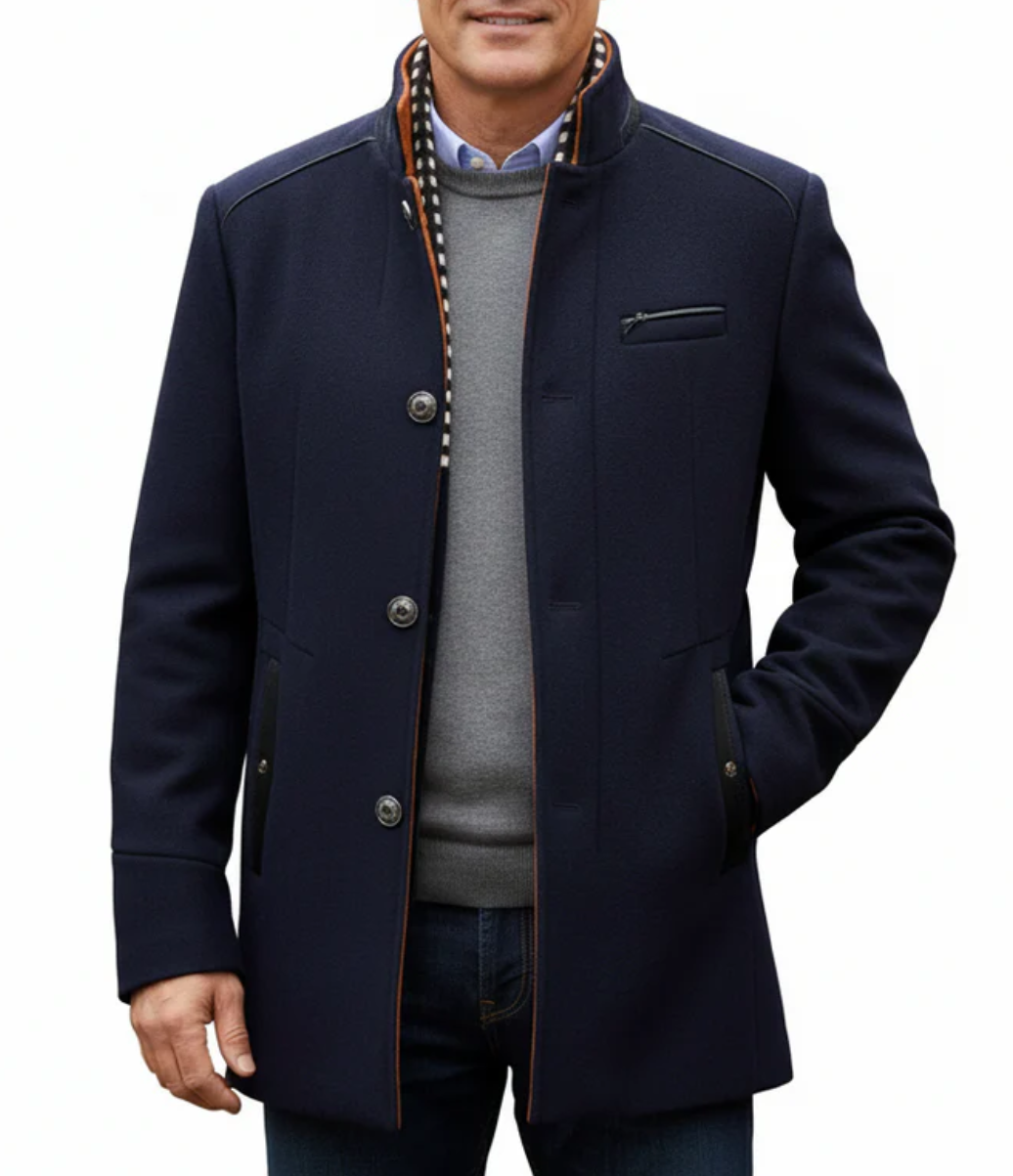 Man wearing a navy blue coat with a white background