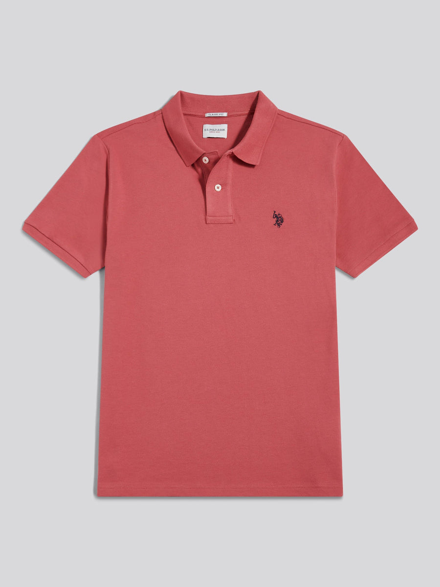 Red polo shirt with a small logo on a gray background
