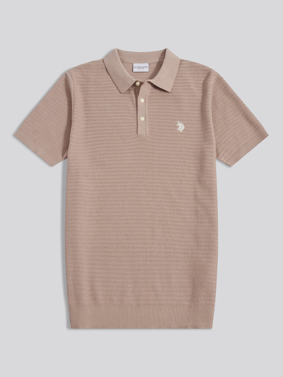 Beige knitted polo shirt with a small logo on a light gray background