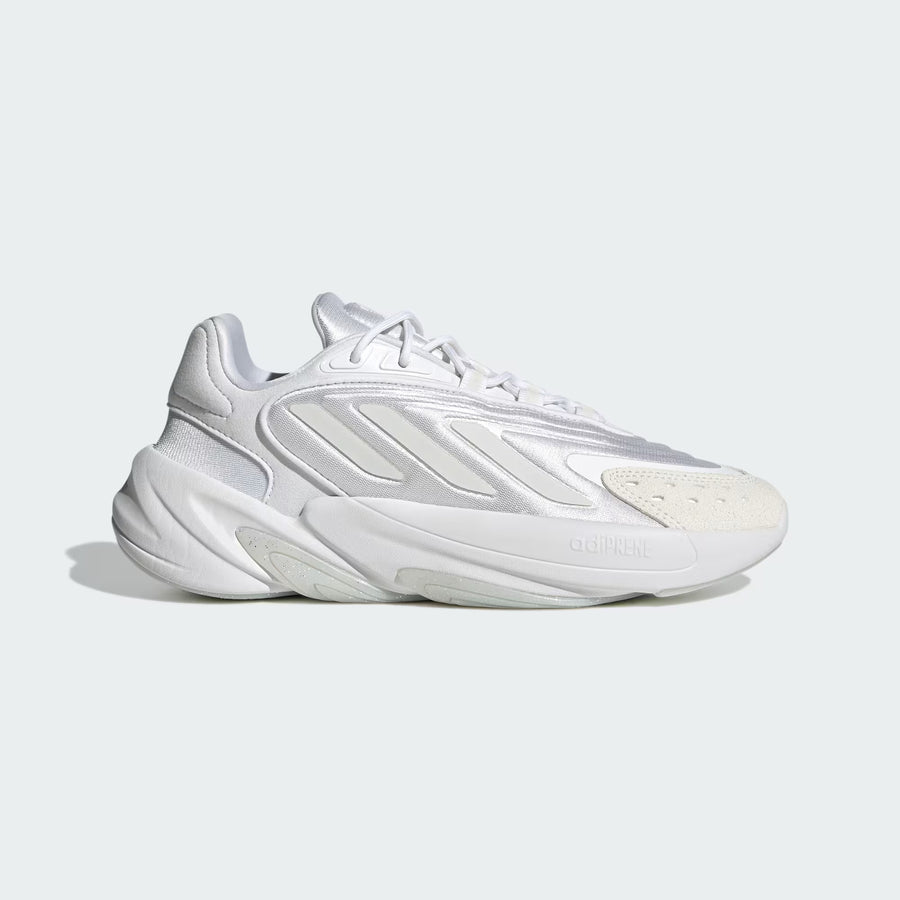 White Adidas sneaker on a light gray background