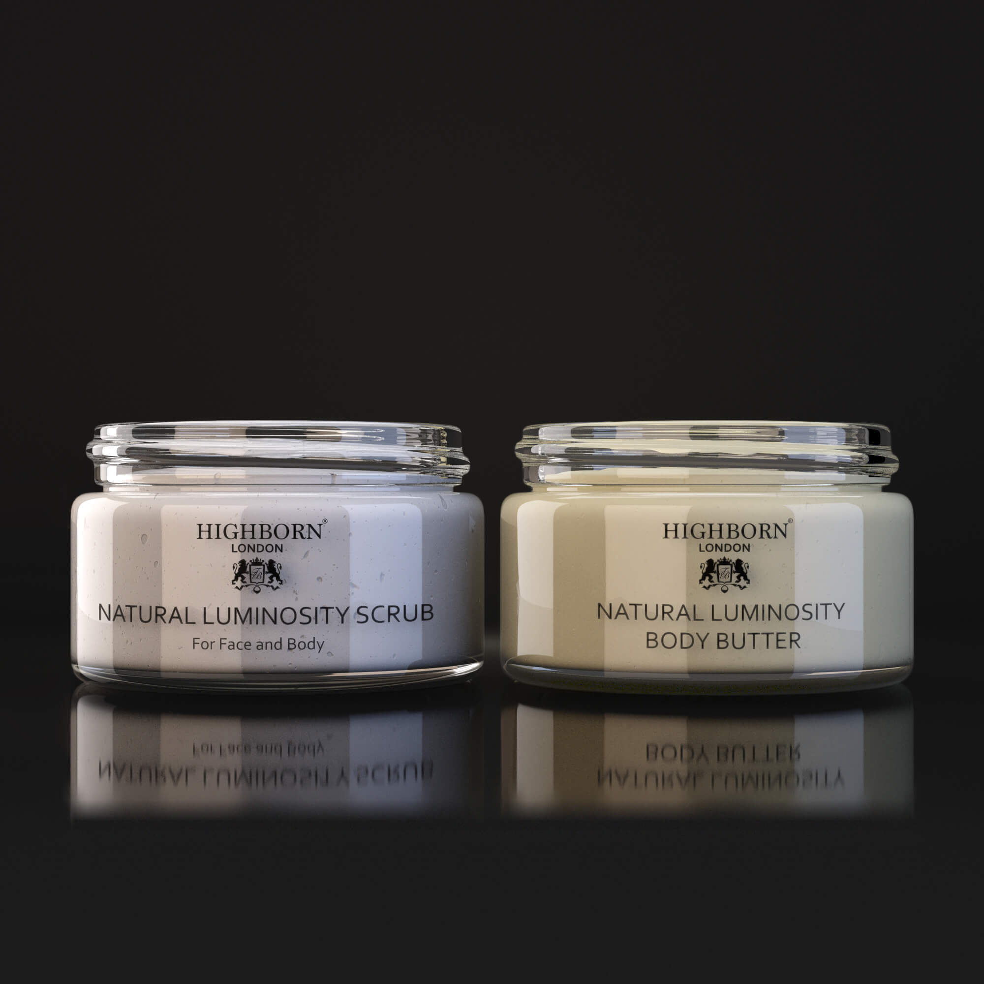 Two jars of Highborn Natural Luminosity Scrub and Body Butter on a black background