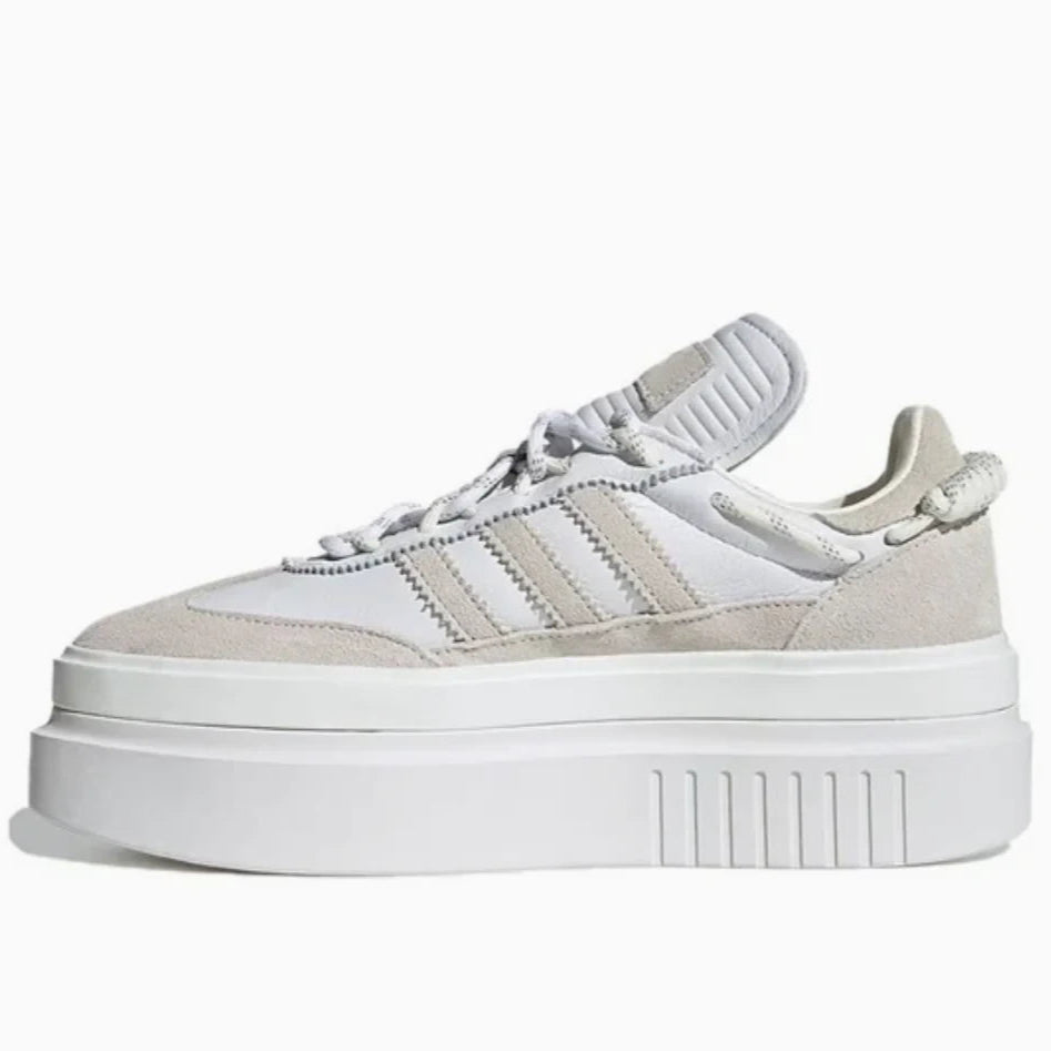 A pair of Adidas Originals x Ivy Park Super Sleek 72 white leather sneakers with an exaggerated double-stacked midsole and bungee detail.