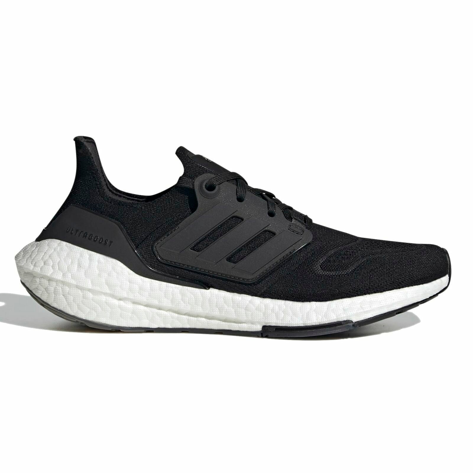 A pair of Adidas ULTRABOOST 22 W GX5591 running shoes in black color with white midsole.