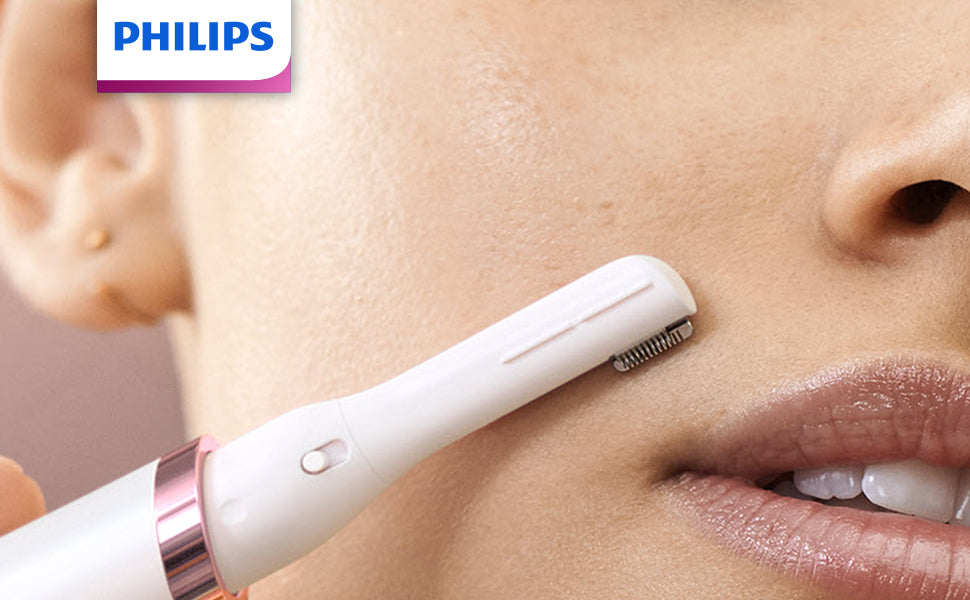 Philips device being used on a person's face with a close-up view.
