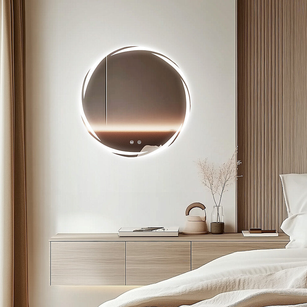 Modern bedroom with a round illuminated mirror above a wooden nightstand.