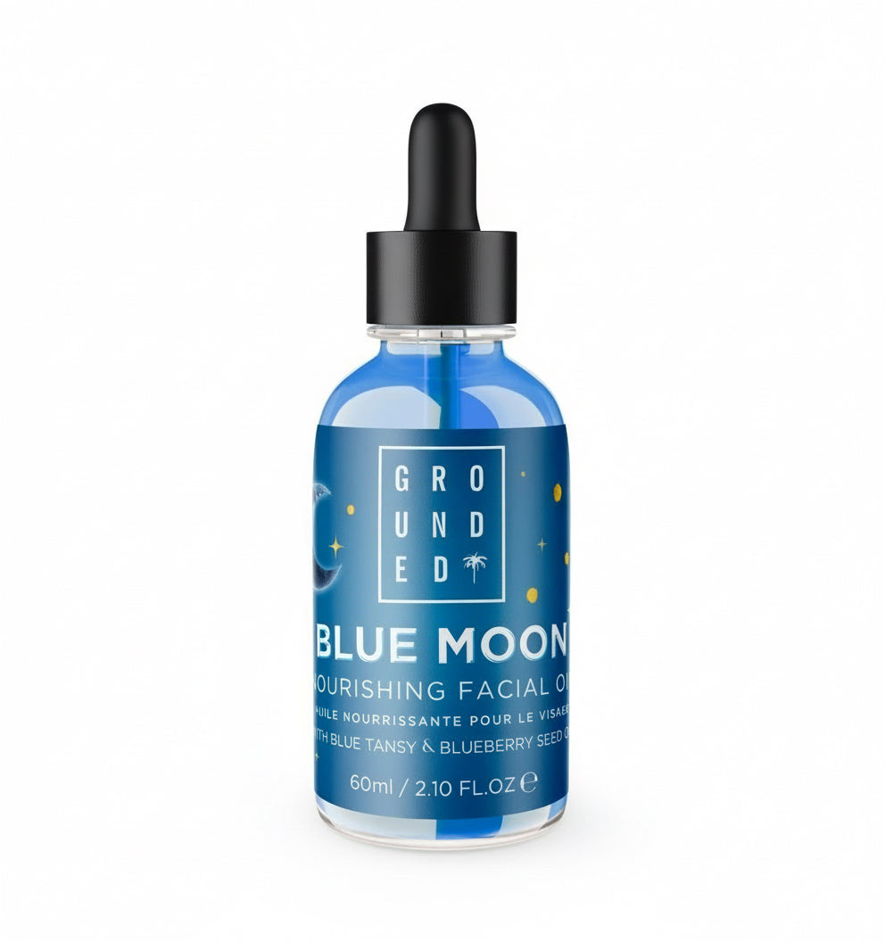 Blue Moon facial oil bottle with dropper on a white background