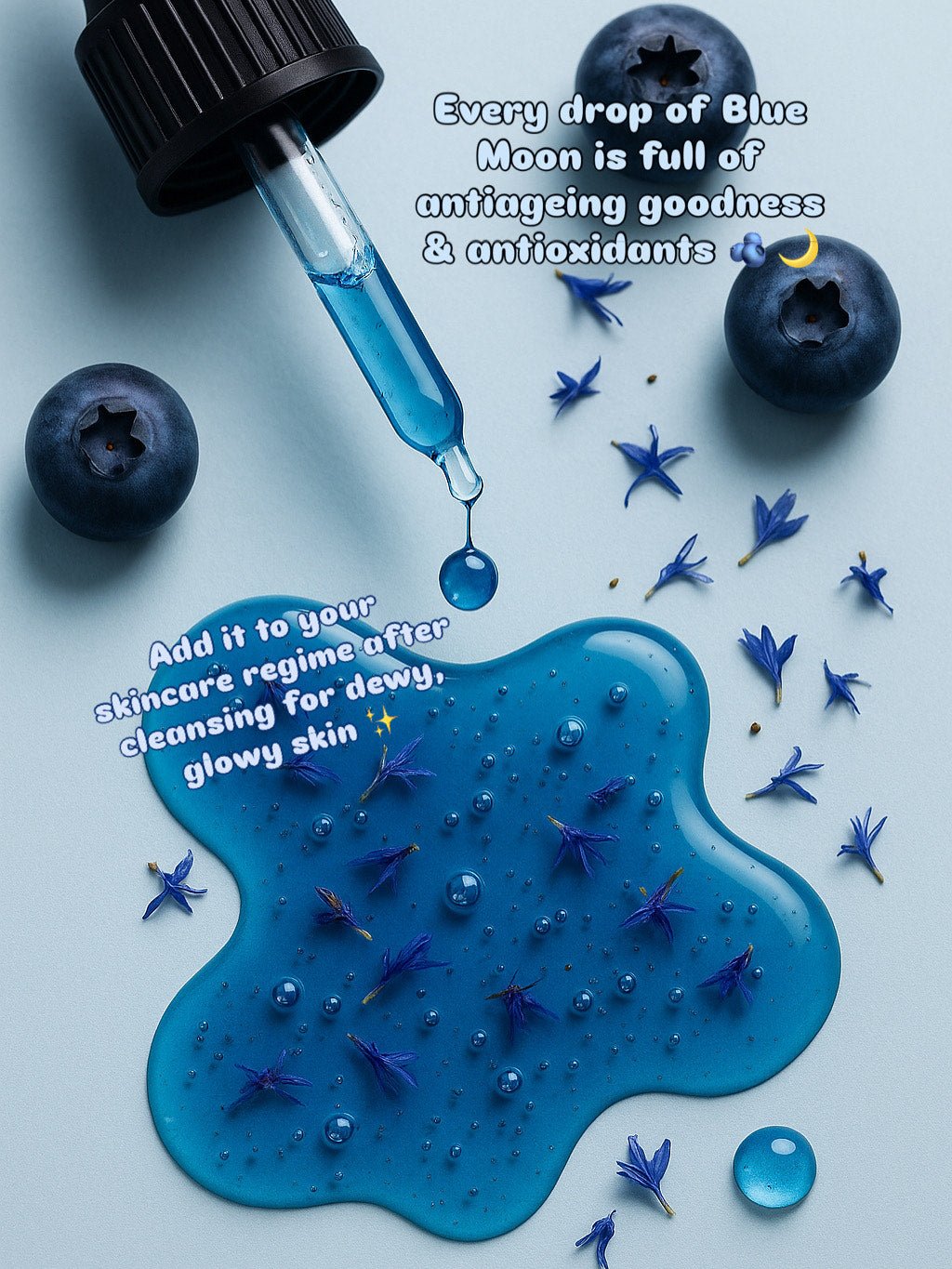 Blue liquid being dripped from a dropper with blueberries and flowers on a light blue background.
