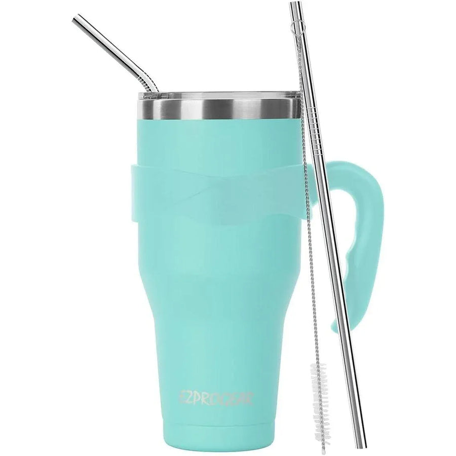 Turquoise tumbler with handle and metal straws on a white background