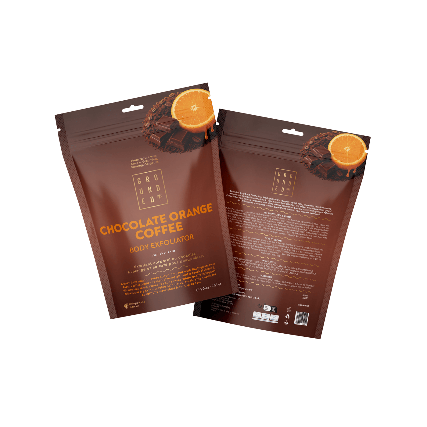 Two packages of Chocolate Orange Coffee Body Exfoliator on a transparent background