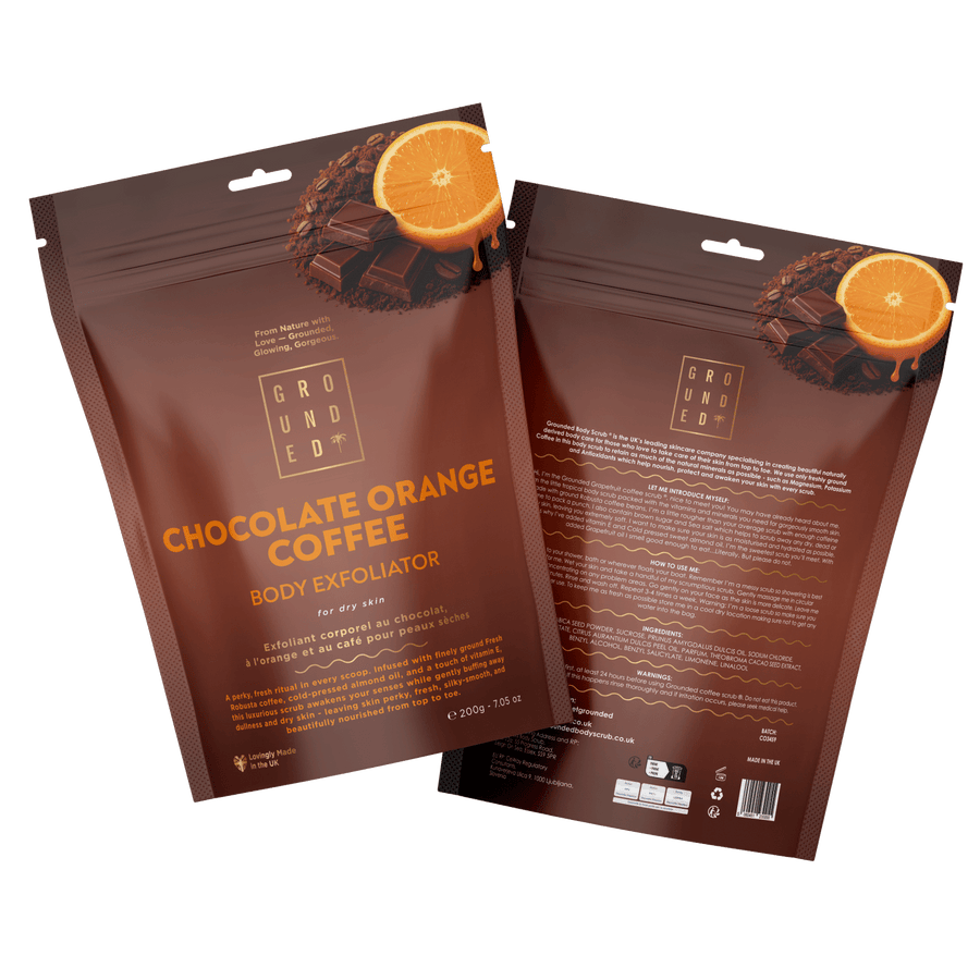 Two packages of Grounded Chocolate Orange Coffee Body Exfoliator on a transparent background