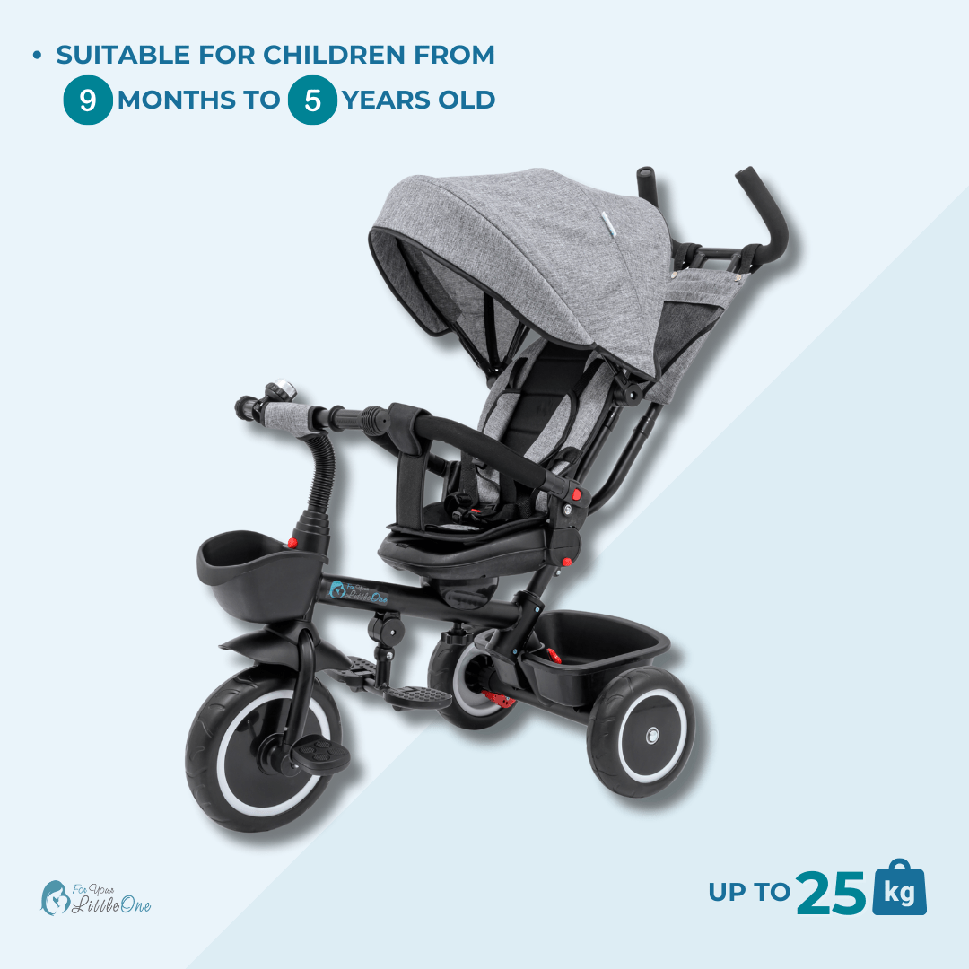 Children's tricycle with a gray canopy on a light blue background
