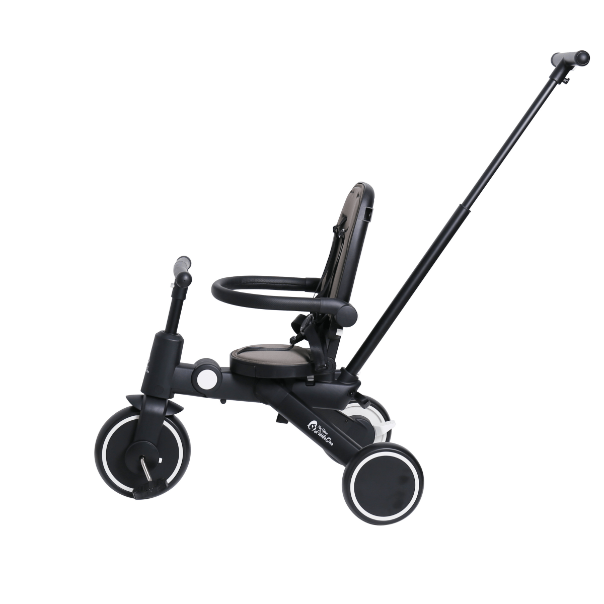 Black baby tricycle with adjustable handlebar on a white background