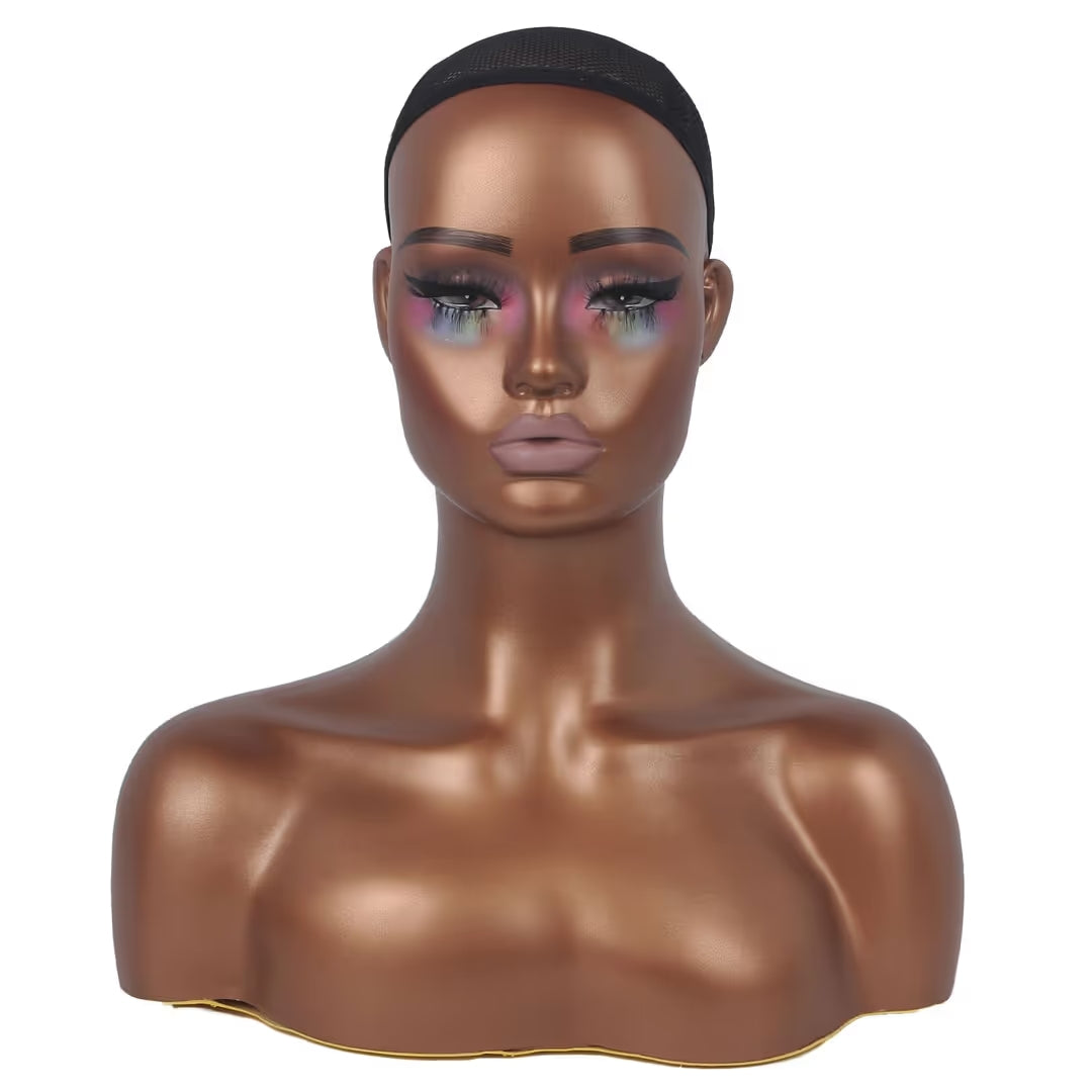 Mannequin head with makeup on a white background