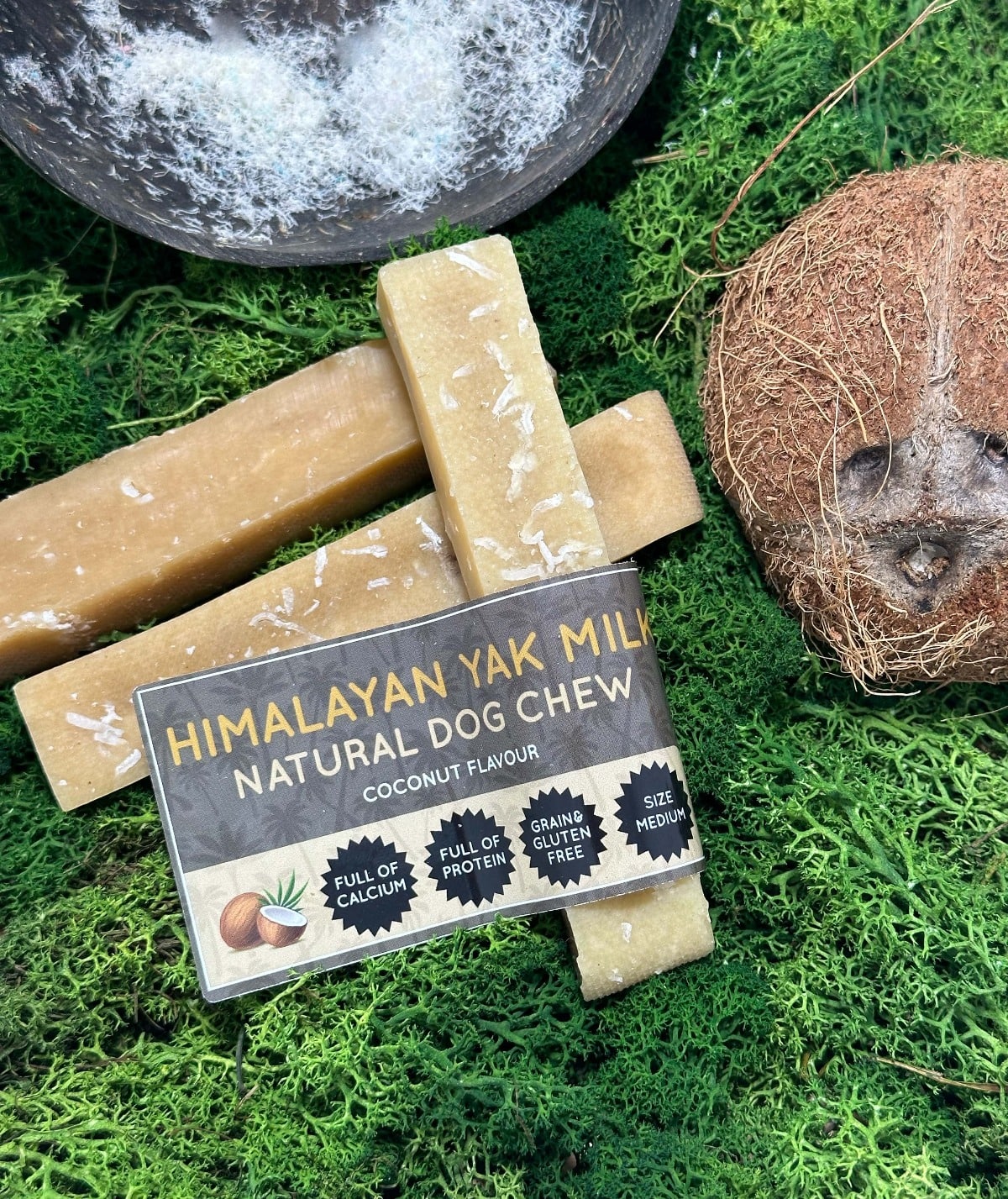 Himalayan Yak Milk Natural Dog Chew with coconut on a green background