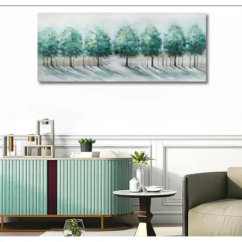 Decorative painting of trees on a wall in a living room setting