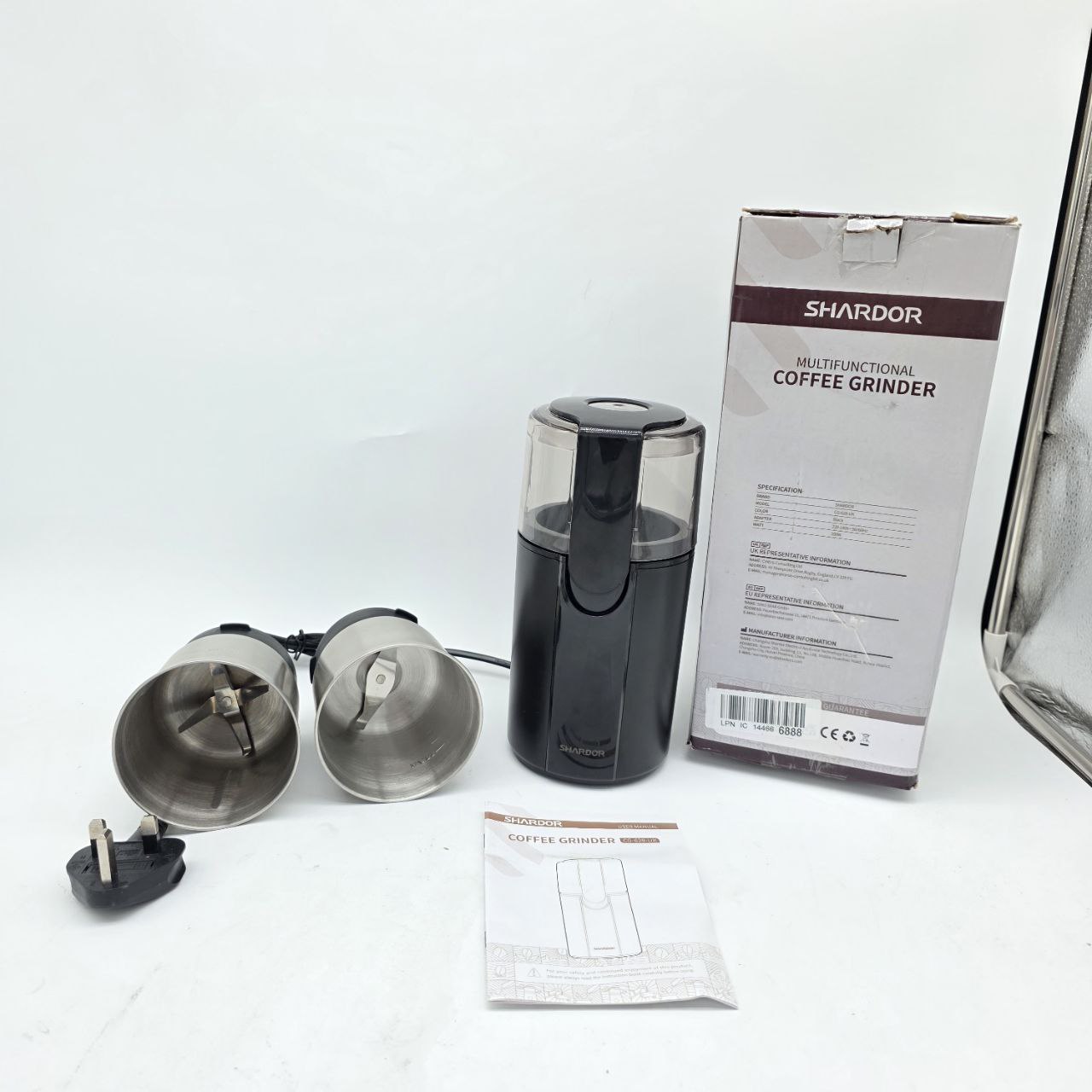 Shardor coffee grinder with attachments and packaging on a white background