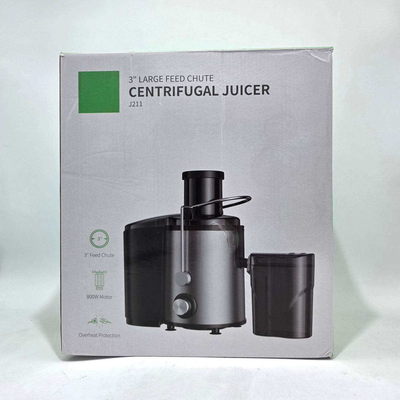 Box of a centrifugal juicer with text and graphics on a white background