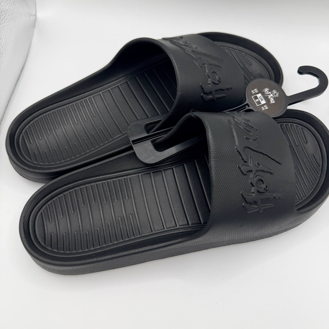 Black slides with a brand logo on a white background