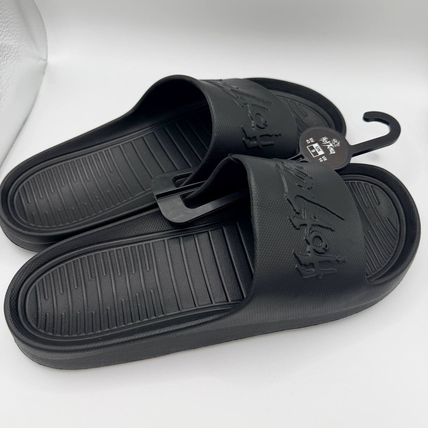Black slides with a brand logo on a white background