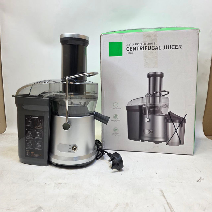 Centrifugal juicer with packaging on a white background