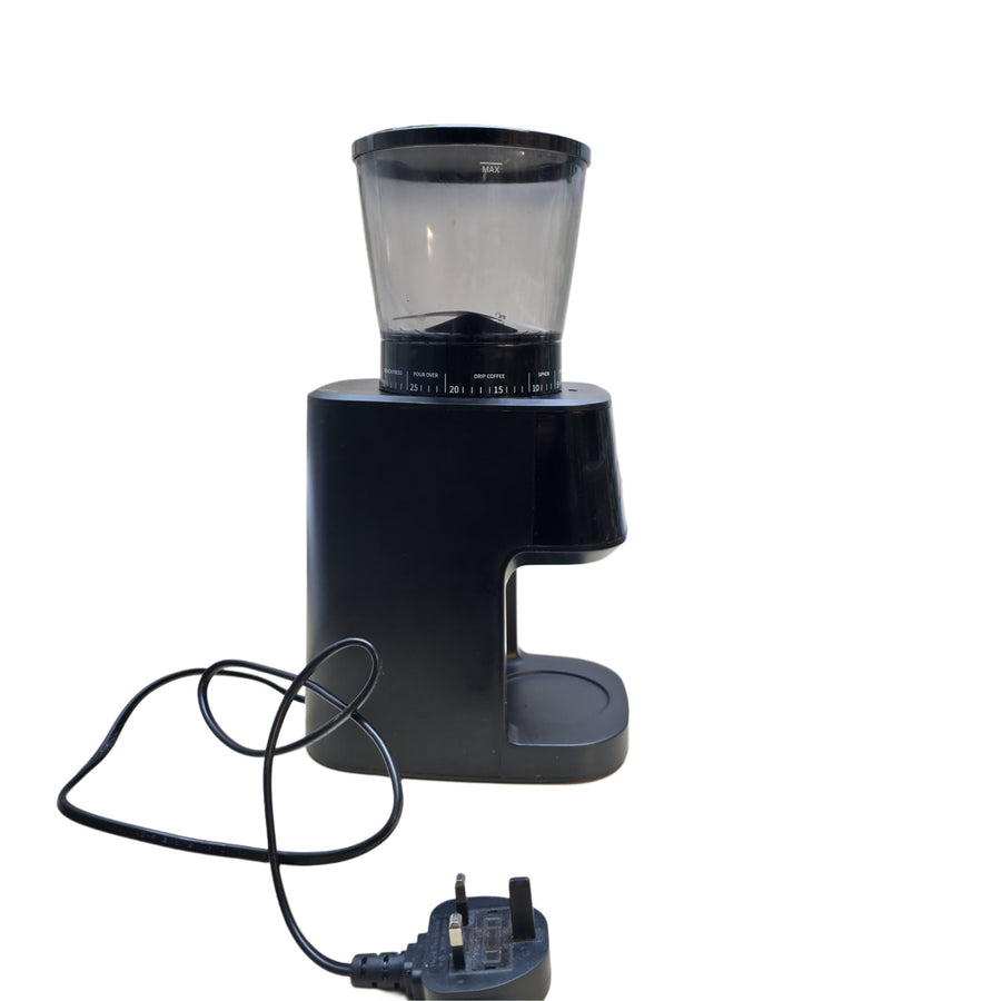 Black coffee grinder with power cord on a white background