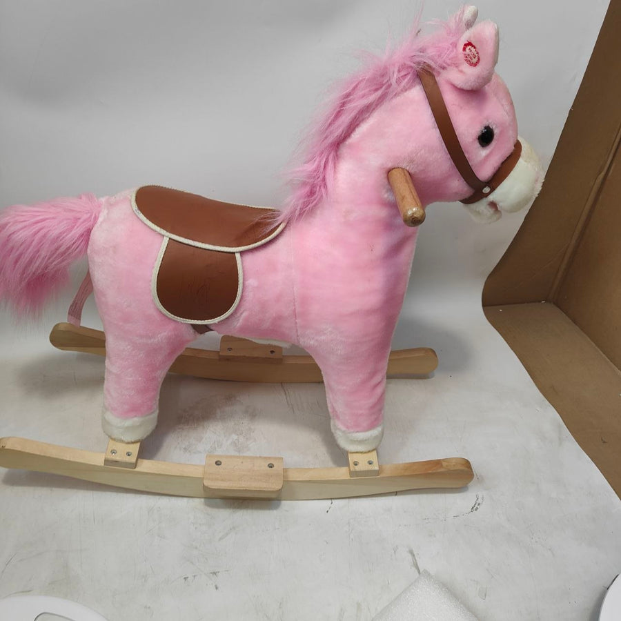 Pink rocking horse with a brown saddle on a white surface