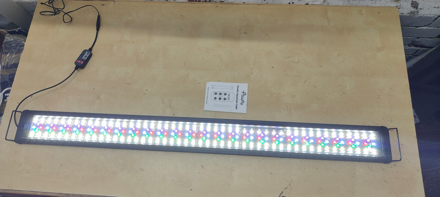 LED light bar with control unit on a wooden surface