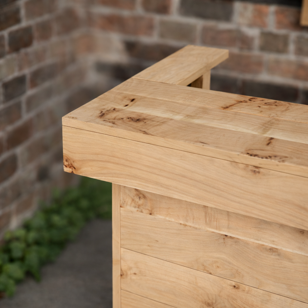 Wooden planter box against a brick wall