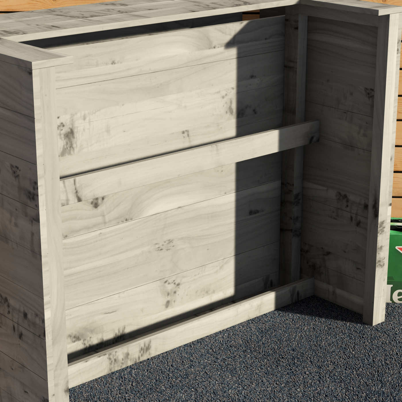 Wooden storage unit with a sliding door on a gravel surface