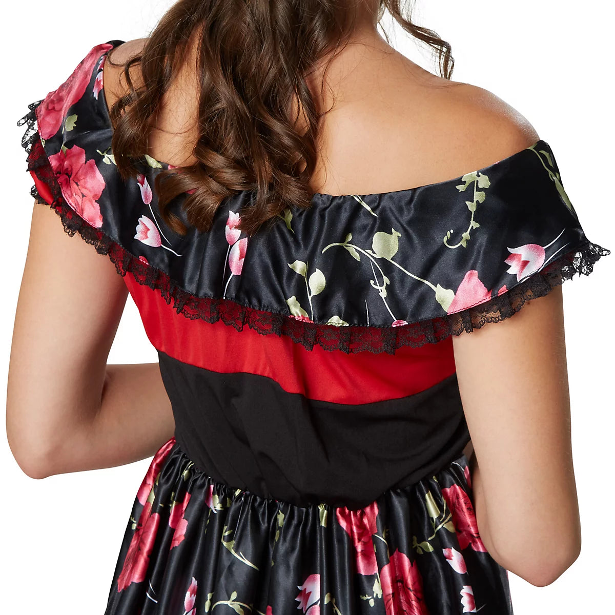 Woman wearing a floral off-shoulder dress with a black background