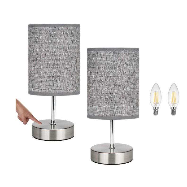 Two gray table lamps with metal bases on a white background, including two light bulbs.