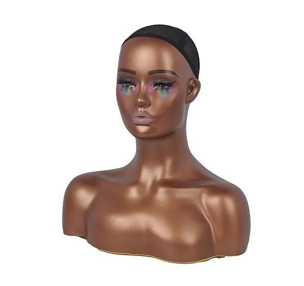 Mannequin head with a wig on a white background
