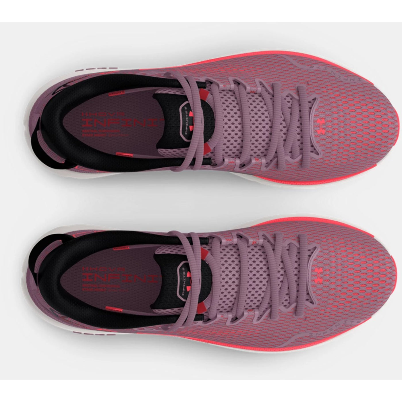 Pair of pink running shoes with black and red accents on a white background