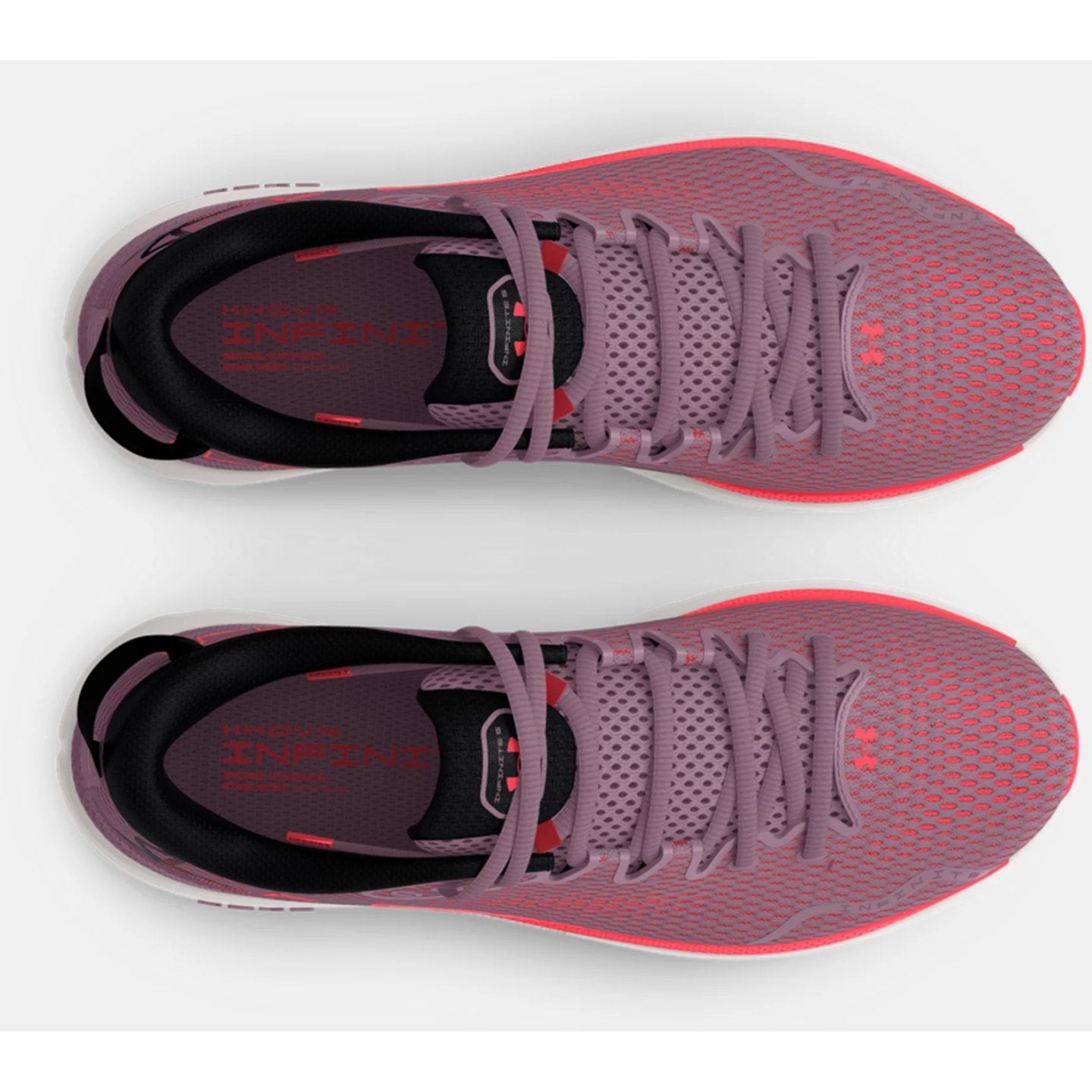 Pair of pink running shoes with black and red accents on a white background